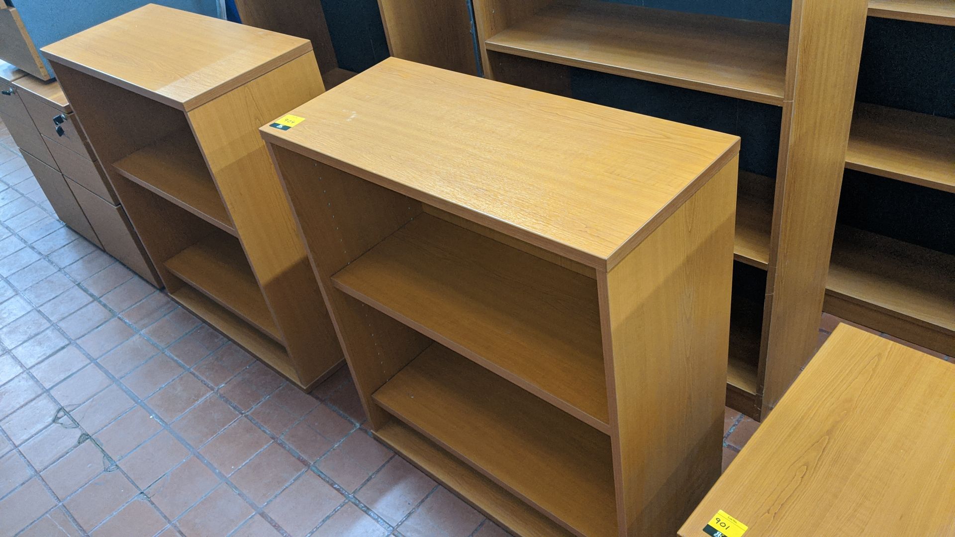 2 off small open front wooden bookcases to match the bulk of the other office furniture in this