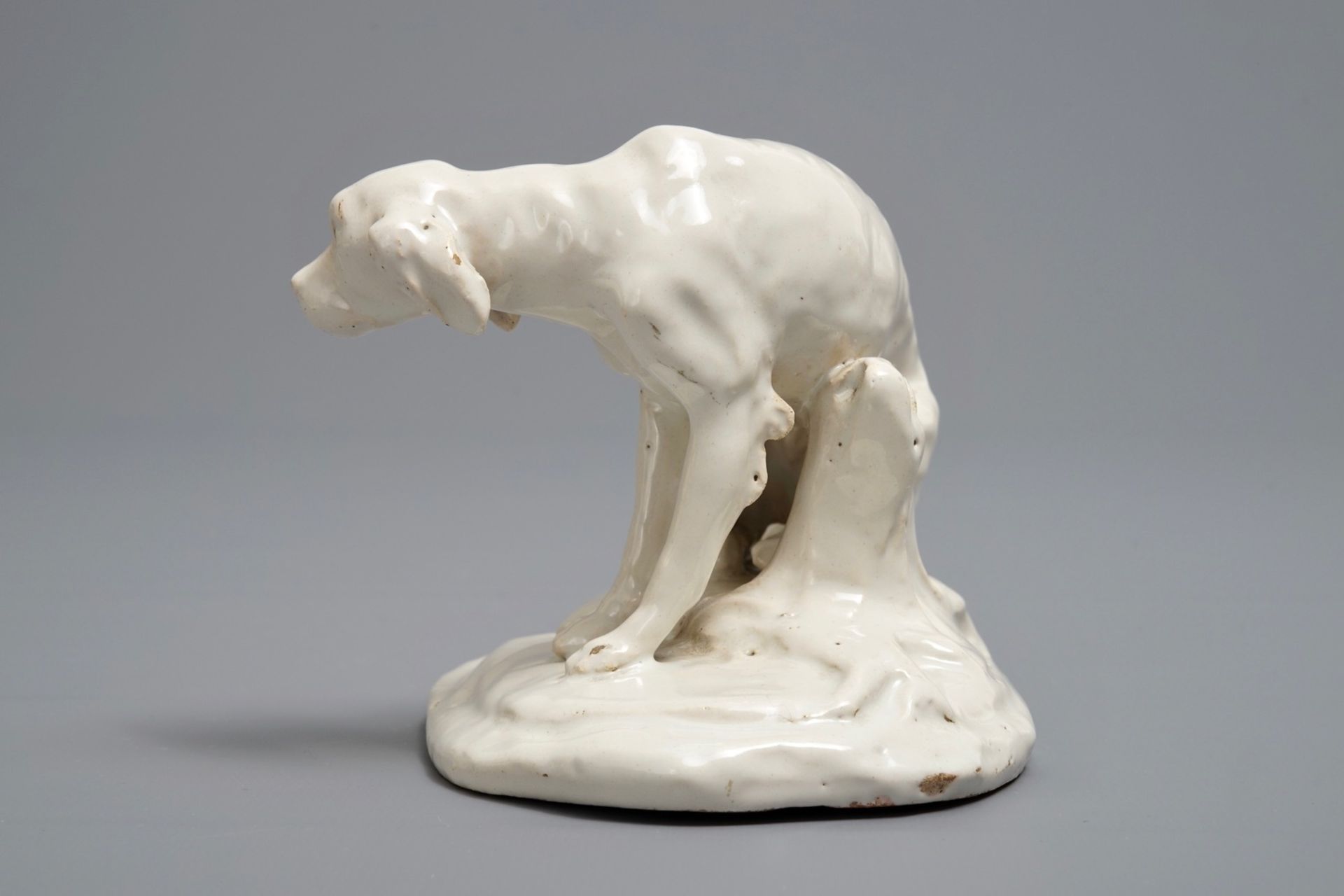 A white Dutch Delft model of a dog, 18th C. - Image 3 of 7