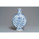 A Chinese blue and white 'dragon' moonflask, 19th C.