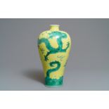 A Chinese yellow and green enamelled meiping 'dragon' vase, 19/20th C.