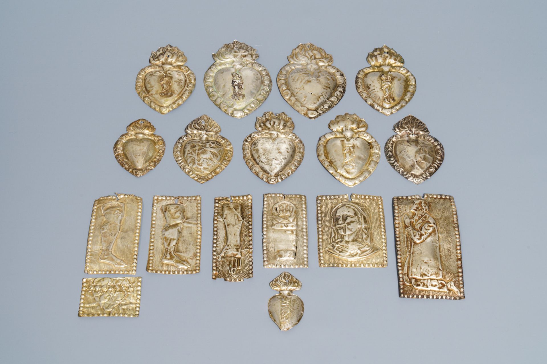 A collection of seventeen silver ex-voto plaques, 19/20th C.