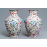 A pair of Chinese famille rose 'millefleurs' vases, Qianlong mark, Republic, 20th C.