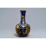 A Chinese powder blue and gilt 'dragon' vase, ca. 1900