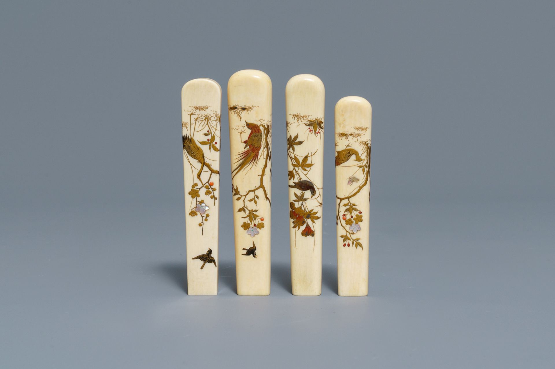 A Japanese Shibayama inlaid ivory magnifier and four handles, Meiji, 19th C. - Image 2 of 4