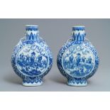 A pair of Chinese blue and white moonflasks, 19th C.