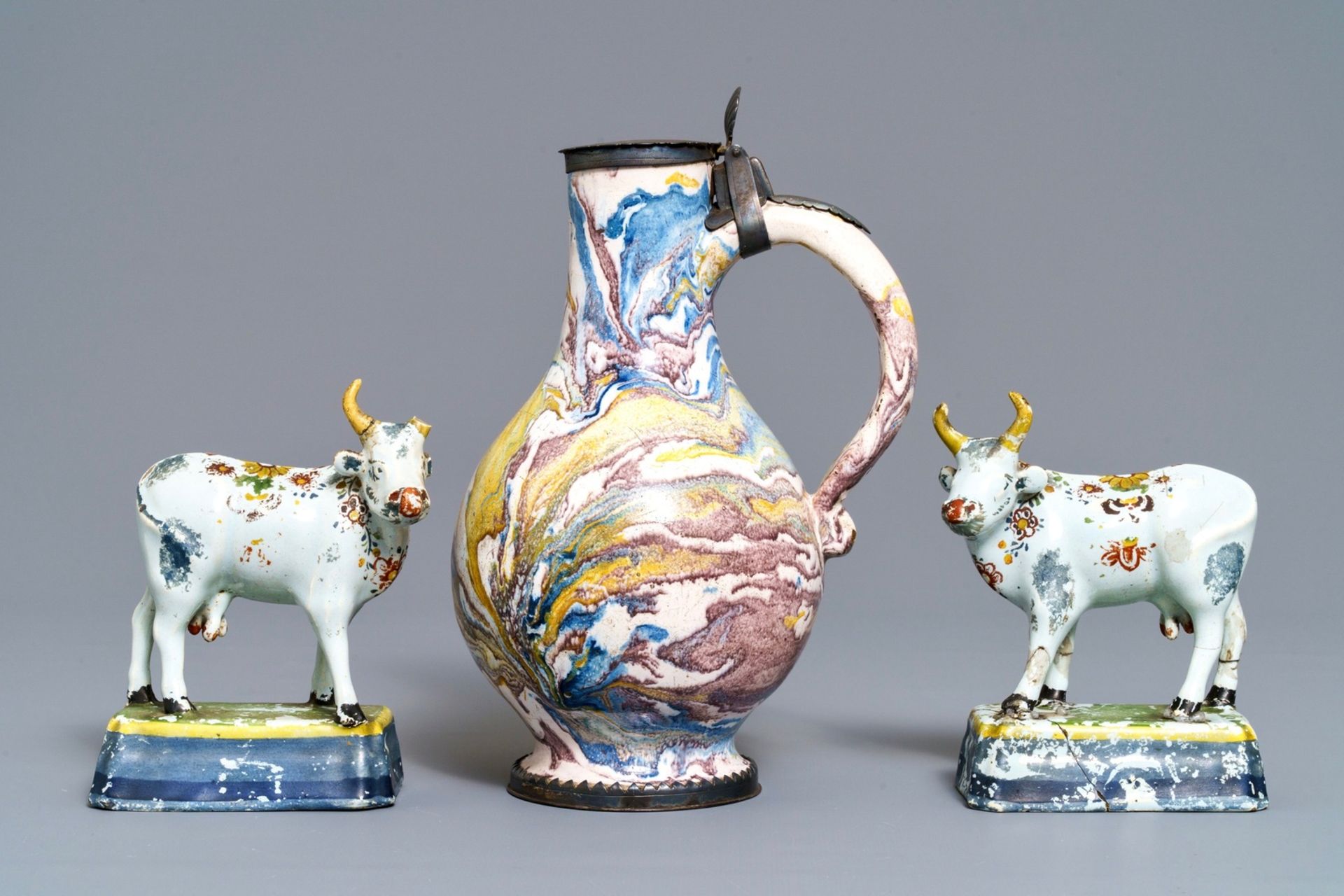 Two pairs of Dutch Delft cows and a pewter-mounted Habaner jug, 18th C. - Image 5 of 7