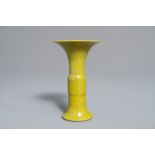 A small Japanese monochrome yellow crackle-glazed 'gu' vase, Awaji, Edo, 19th C.