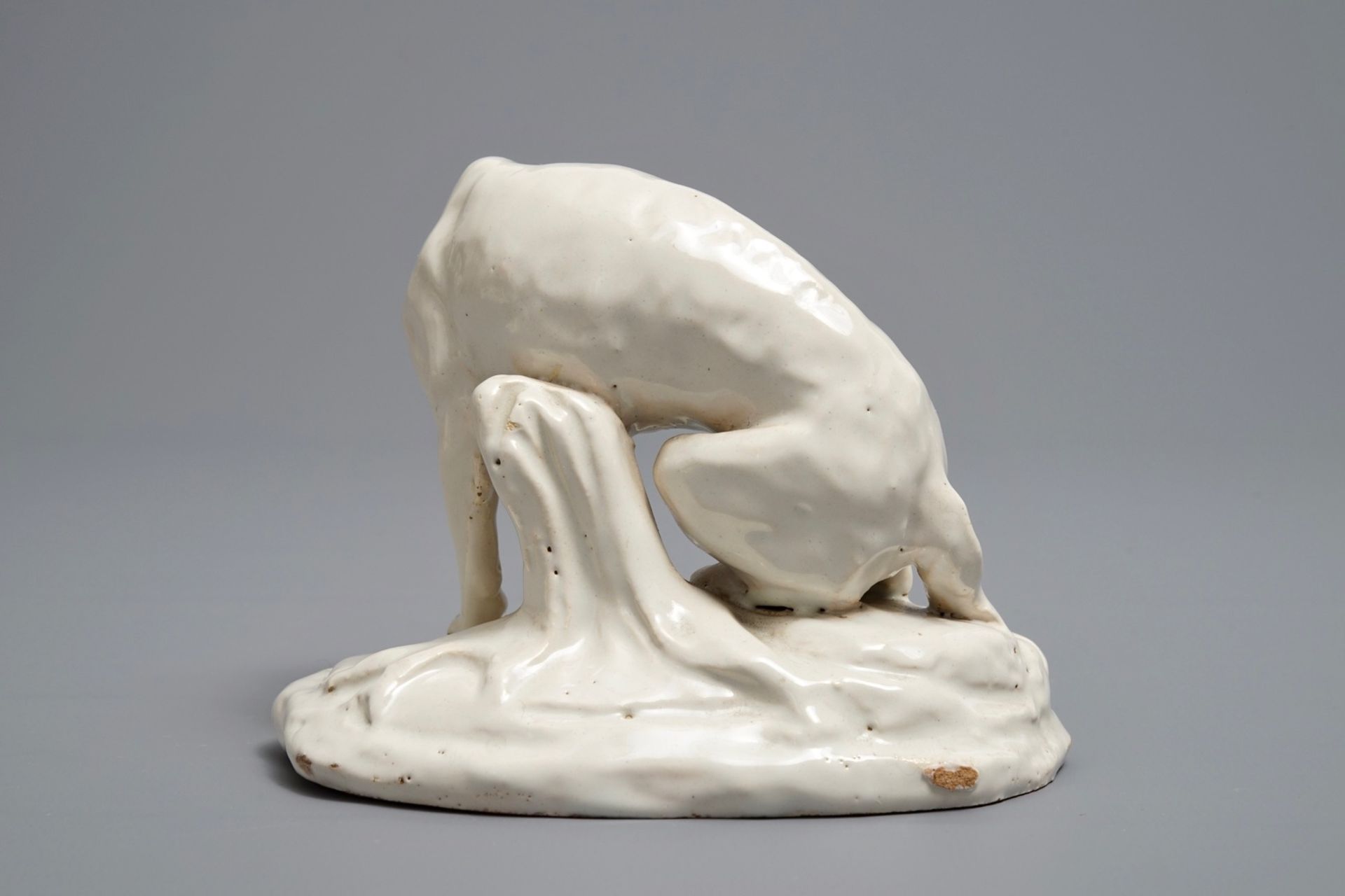 A white Dutch Delft model of a dog, 18th C. - Image 4 of 7