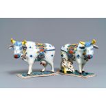 Two polychrome Dutch Delft models of cows on bases, 18th C.