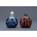 Two Chinese overlay red and blue snowflake glass snuff bottles, 19th C.
