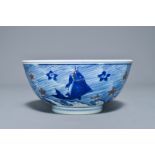 A rare Chinese blue and underglaze red bowl with carps and marine animals, Xuande mark, Kangxi