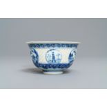 A Chinese blue and white reticulated bowl with landscape panels, Transitional period