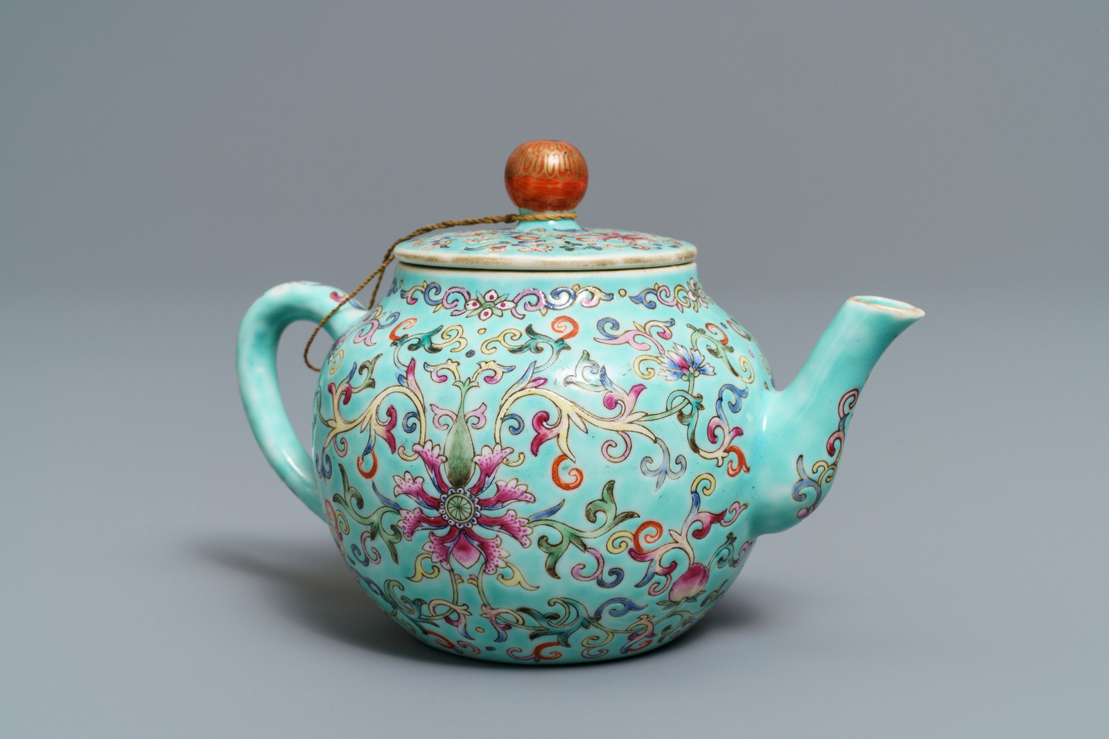 A Chinese turquoise-ground famille rose teapot, Jiaqing mark, Republic, 20th C.