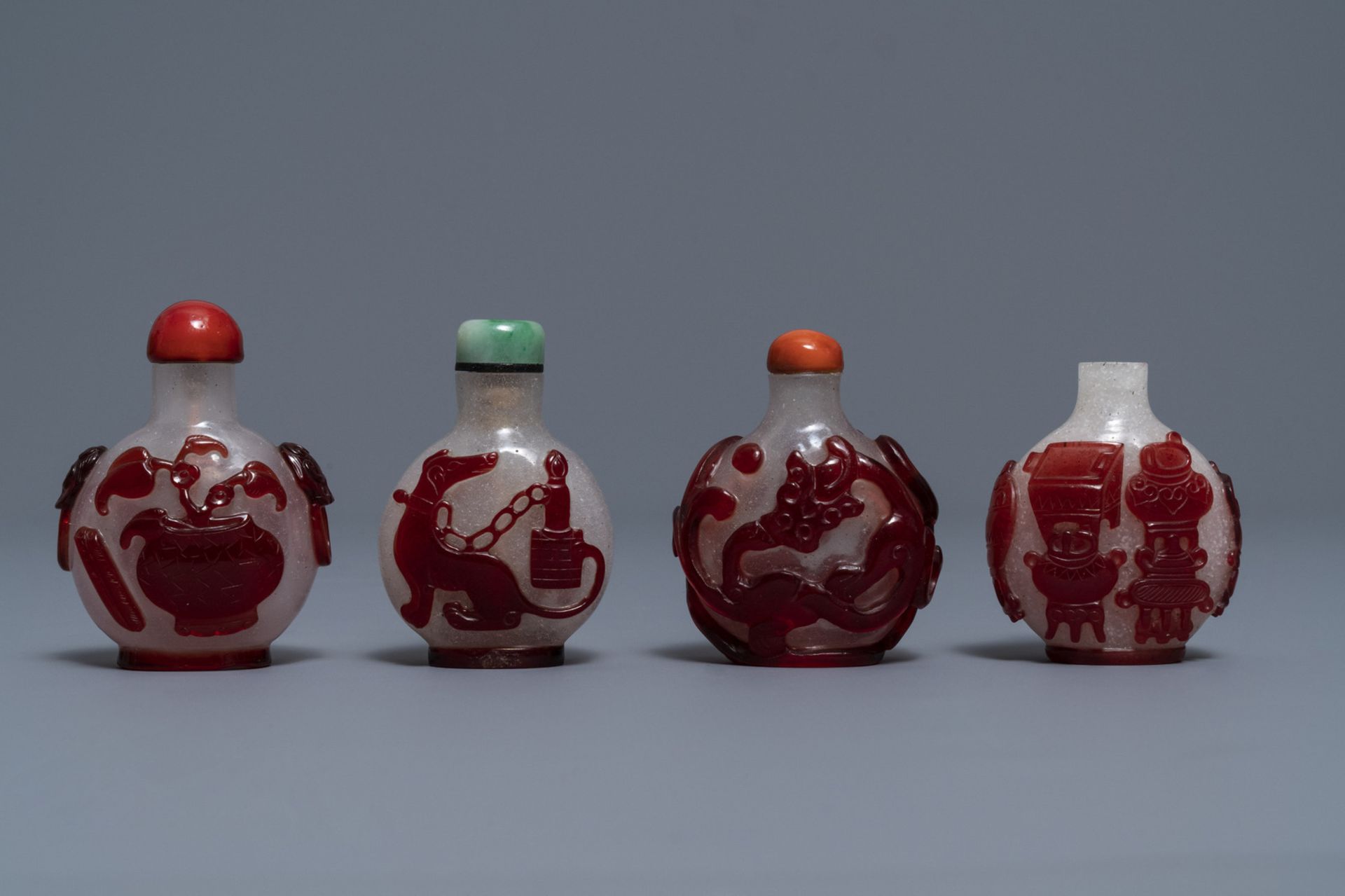 Four Chinese red overlay snowflake glass snuff bottles, 18/20th C. - Image 2 of 4