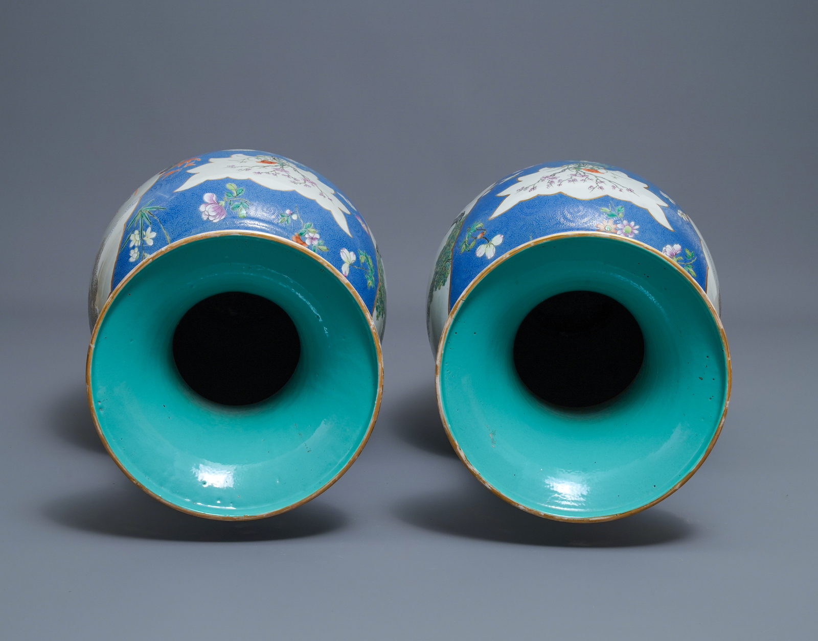 A pair of large Chinese blue-ground famille rose vases with figural design, Qianlong mark, 19th C. - Image 5 of 6