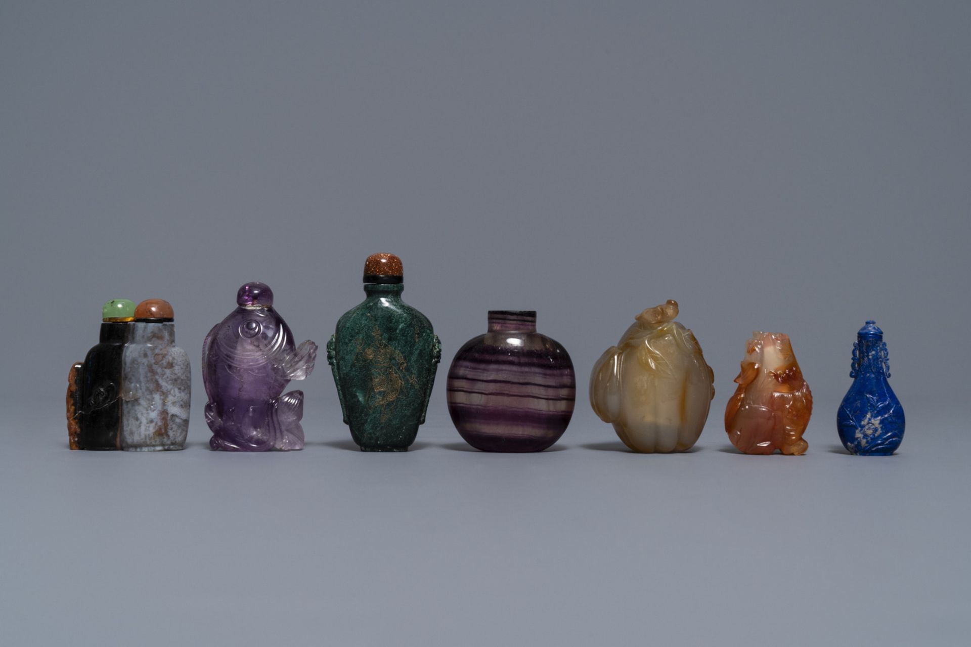 Seven Chinese hardstone, agate and quartz snuff bottles, 19/20th C.