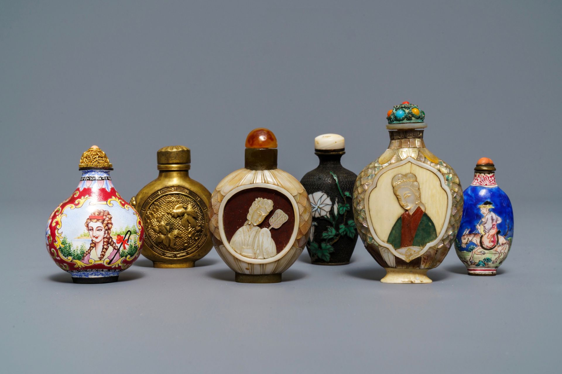 Six Chinese Canton and Beijing enamel, mother of pearl and gilt brass snuff bottles, 18/19th C.