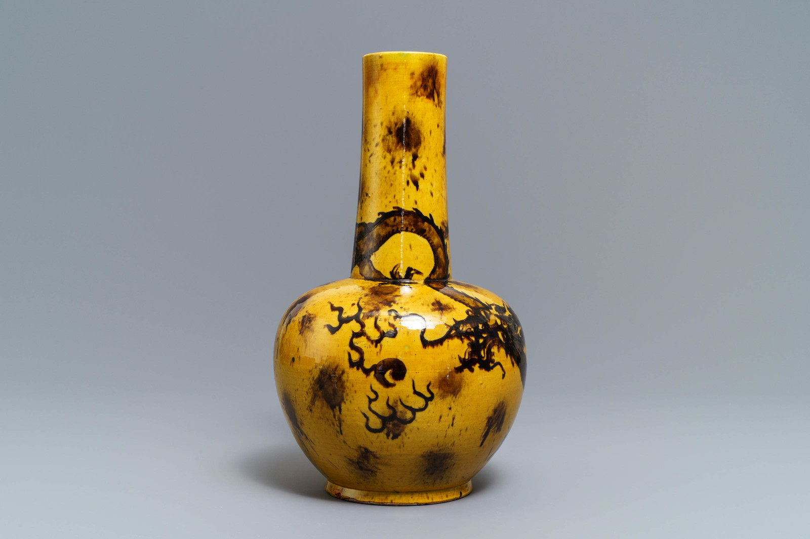 A Chinese yellow-ground bottle vase with a dragon, Qianlong mark, 19/20th C. - Image 2 of 6