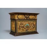 A turquoise-inlaid gilt bronze and copper repoussŽ 'tepchog' folding altar table, Tibet, 19th C.