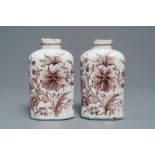 A pair of manganese Dutch Delft tea caddies with floral design, 18th C.