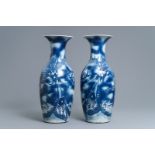 A pair of Chinese blue and white 'dragon and carp' vases, 19th C.