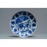 A Chinese blue and white moulded 'two horses' kraak plate, Wanli