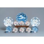 Eight Chinese blue and white and famille rose cups and saucers and three plates, Kangxi/Qianlong