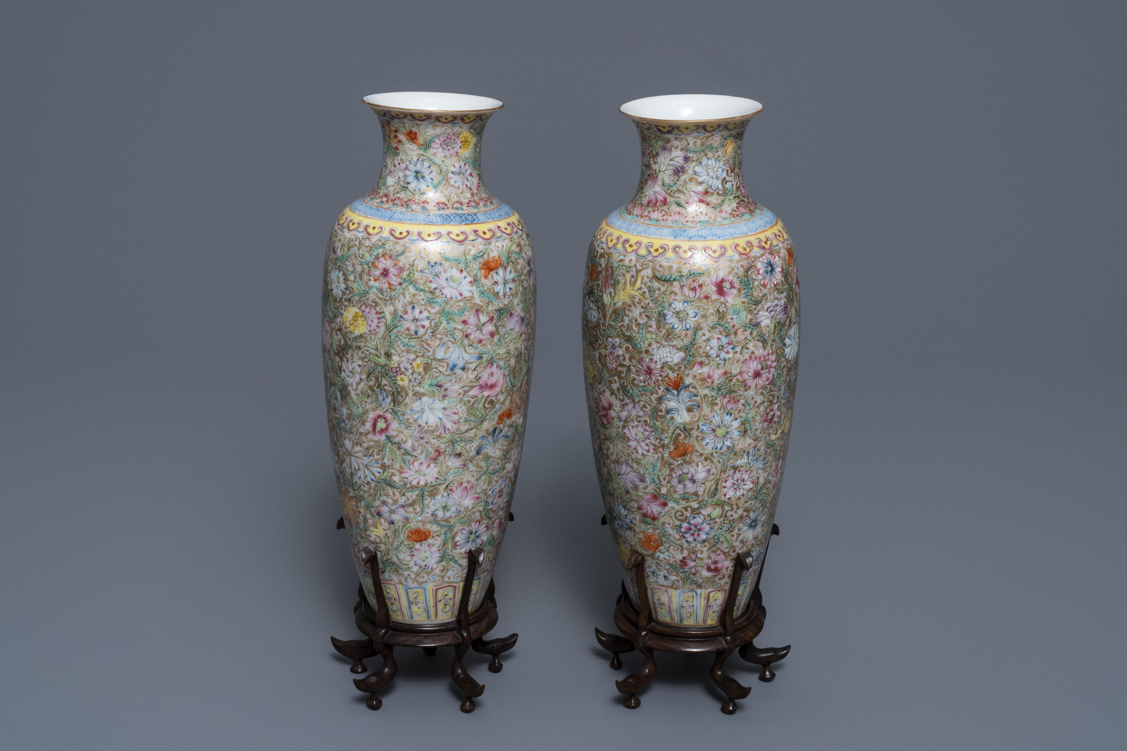 A pair of Chinese famille rose 'millefleurs' eggshell vases, Qianlong mark, Republic, 20th C. - Image 2 of 8