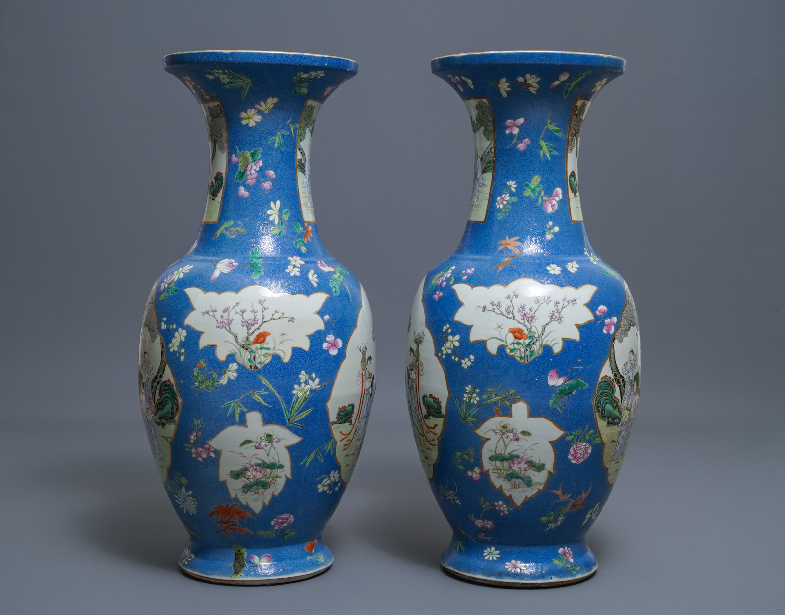 A pair of large Chinese blue-ground famille rose vases with figural design, Qianlong mark, 19th C. - Image 4 of 6