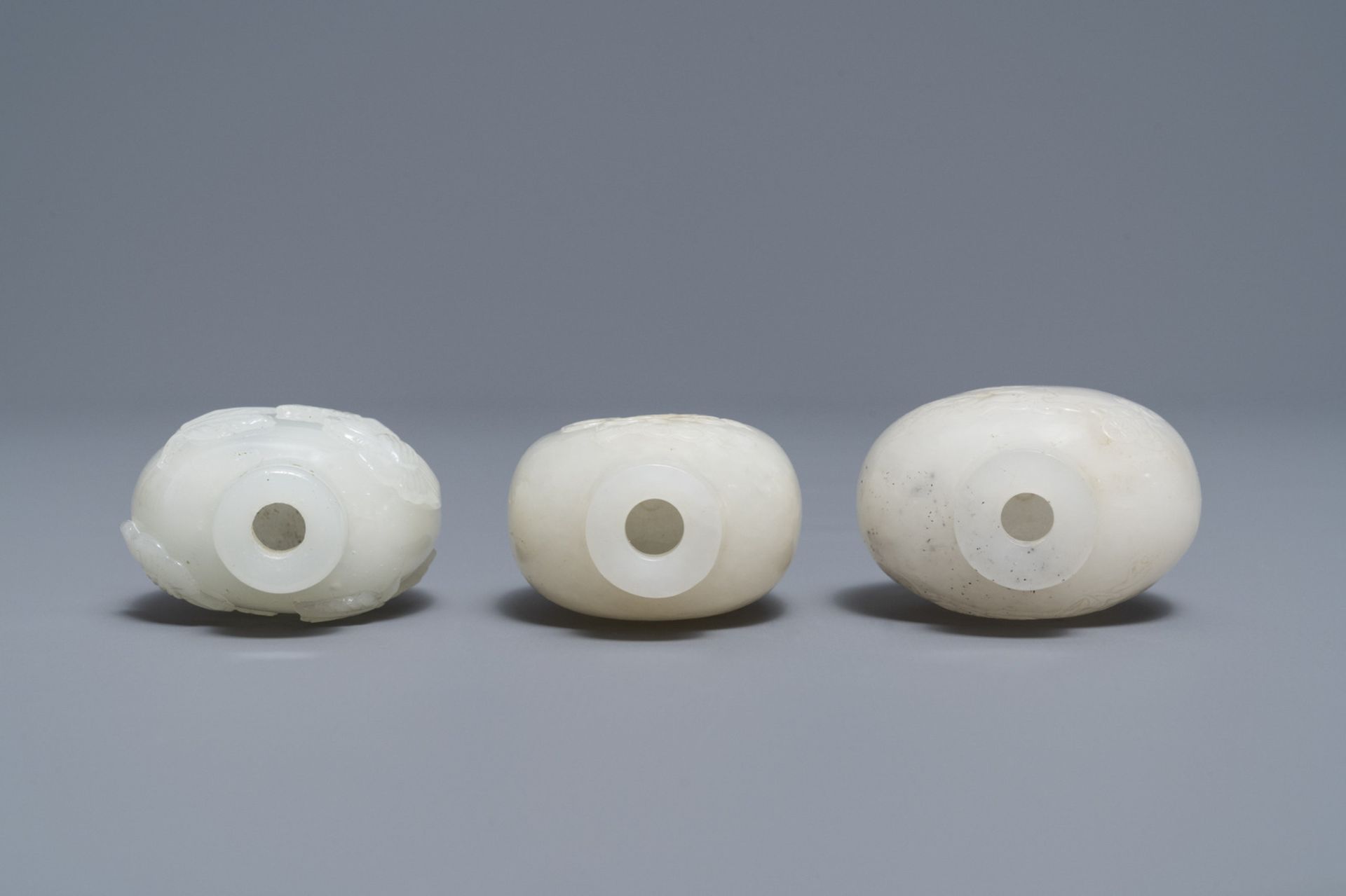 Three Chinese carved pale white jade snuff bottles, 19/20th C. - Image 3 of 4