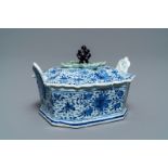 A Dutch Delft blue and white grape-topped butter tub, 18th C.