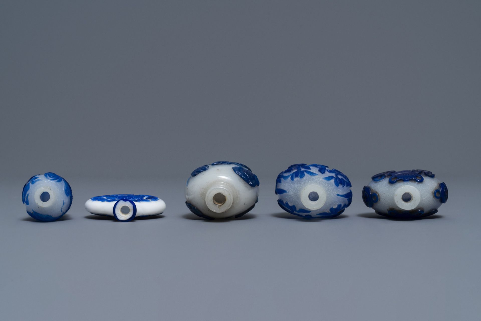 Nine various Chinese blue overlay glass snuff bottles, 19/20th C. - Image 4 of 9