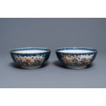 A pair of Chinese famille rose 'mandarin' bowls, Qianlong