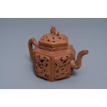 A Chinese Yixing stoneware reticulated teapot and cover, Kangxi