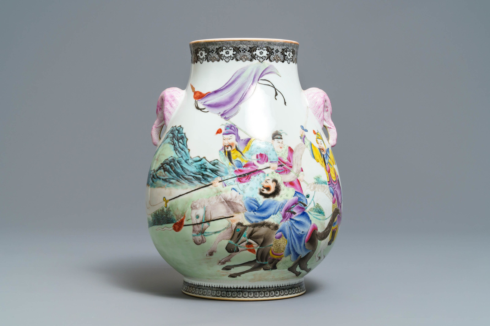 A Chinese famille rose hu vase with warriors on horseback, Qianlong mark, Republic, 20th C. - Image 2 of 7