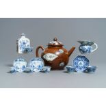 A large Chinese 'capucin' teapot, a blue and white spittoon and various tea wares, Kangxi/Qianlong