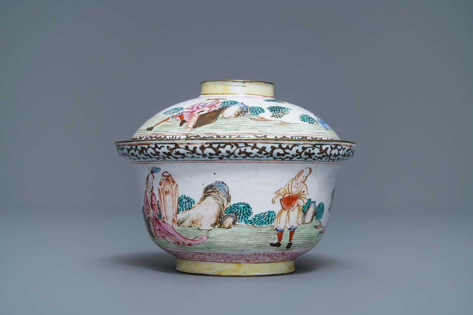 A Chinese Canton enamel 'Europeans' bowl and cover, Qianlong - Image 3 of 7