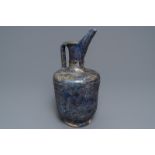 A blue glazed Islamic pottery jug, Kashan, Iran, 13th C.