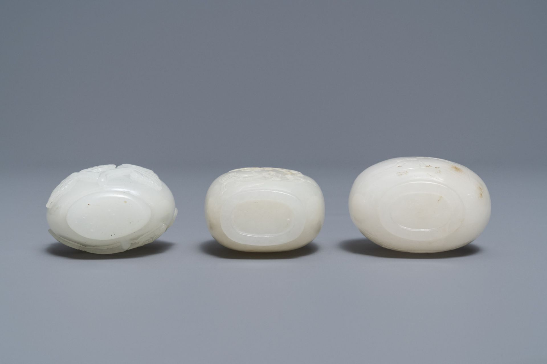 Three Chinese carved pale white jade snuff bottles, 19/20th C. - Image 4 of 4