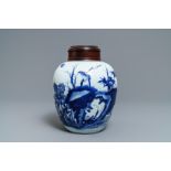 A Chinese blue and white jar with birds among blossoms, Transitional period