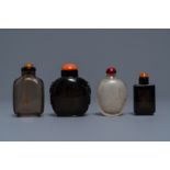 Four Chinese smokey quartz and simulating glass snuff bottles, 18/19th C.