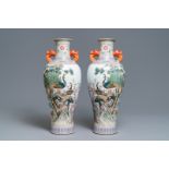 A pair of Chinese famille rose 'peacock' vases, Qianlong mark, Republic, 20th C.