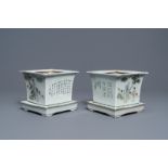 A pair of square Chinese qianjiang cai jardinires on stands, 19/20th C.