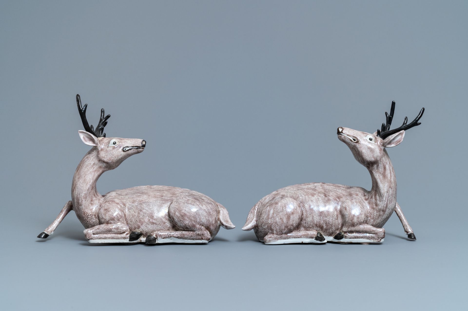 A pair of large Chinese aubergine-glazed models of recumbent deer, 18/19th C. - Image 2 of 7