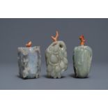 Three Chinese jade snuff bottles with coral stoppers, 19/20th C.