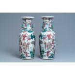 A pair of Chinese famille rose 'court scene' vases, 19th C