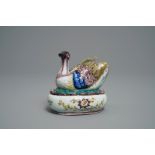 A polychrome Dutch Delft 'plover' butter tub and cover, 18th C.