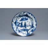 A Chinese blue and white kraak porcelain dish with figures in a landscape, Wanli