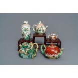 Four Chinese famille rose, verte and Imari-style teapots and a tea caddy, Kangxi and later