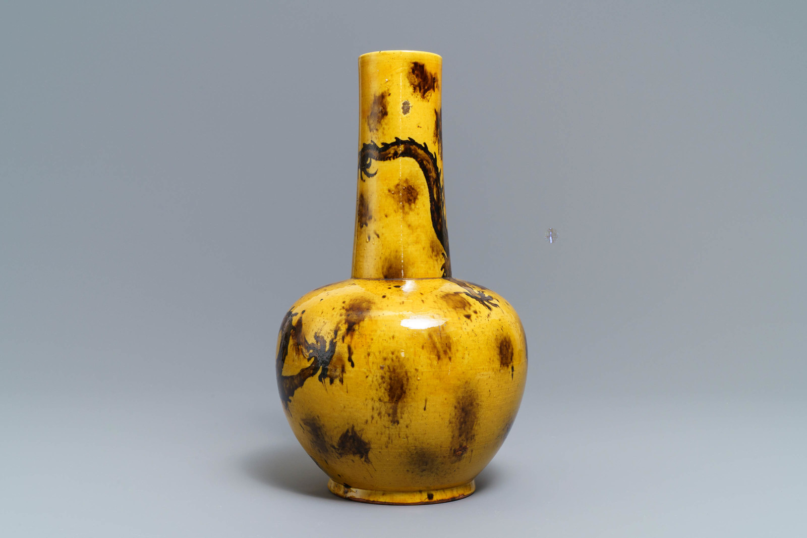 A Chinese yellow-ground bottle vase with a dragon, Qianlong mark, 19/20th C. - Image 4 of 6